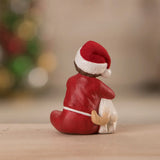 Delaney's Christmas Puppy Surprise Figurine by Bethany Lowe back style