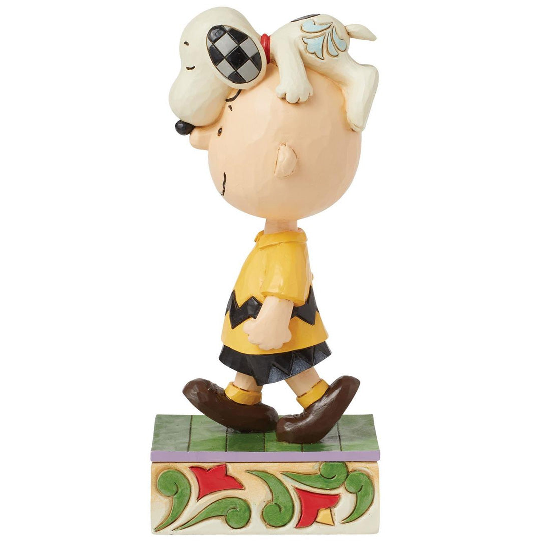 Jim Shore Snoopy on Charlie Browns Head left side