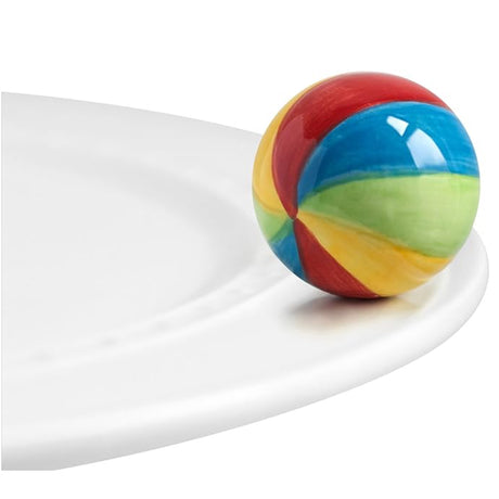 Nora Fleming Beach Ball Mini on the plate