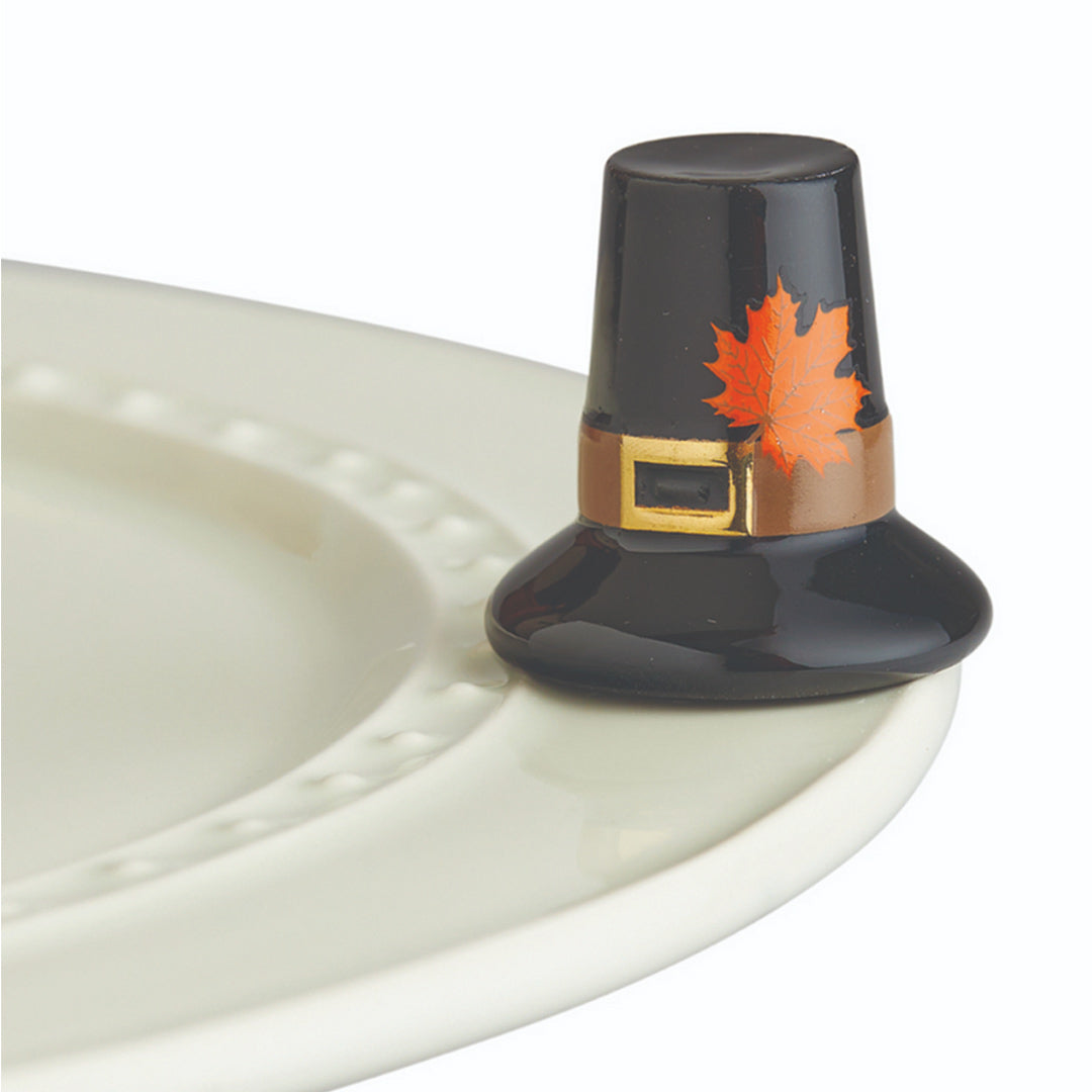 Nora Fleming Pilgrim Hat Mini on the plate