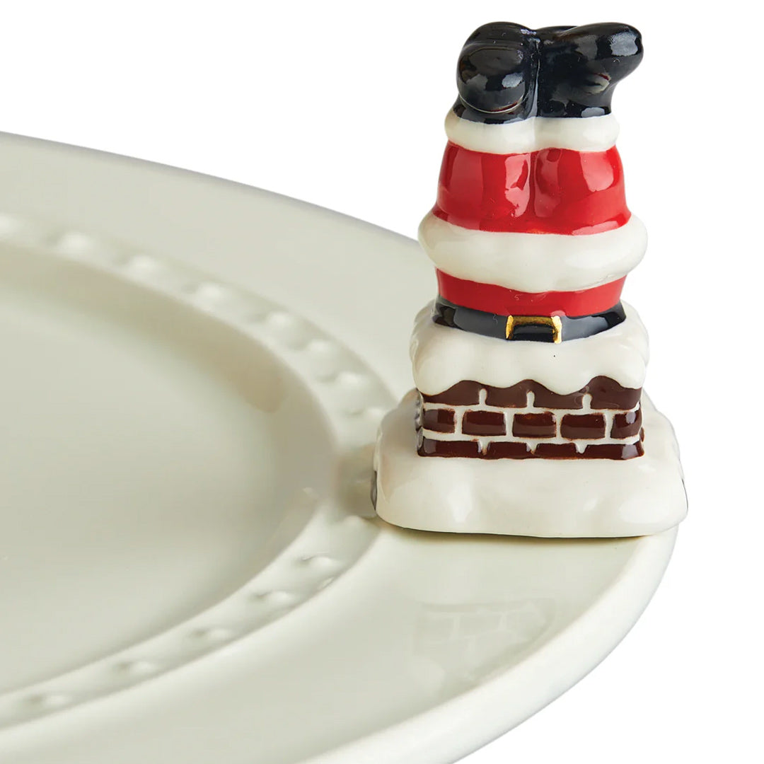 Nora Fleming Santa Legs Mini  on the plate