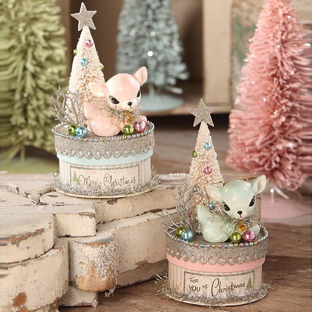 https://www.cuddledecor.com/cdn/shop/products/Cuddle-Decor-Christmas-Pastel-Deer-on-Box-2A_1080x.jpg?v=1652807428